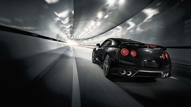 2023 Nissan GT-R seen from behind driving through a tunnel | Cherokee County Nissan in Holly Springs GA
